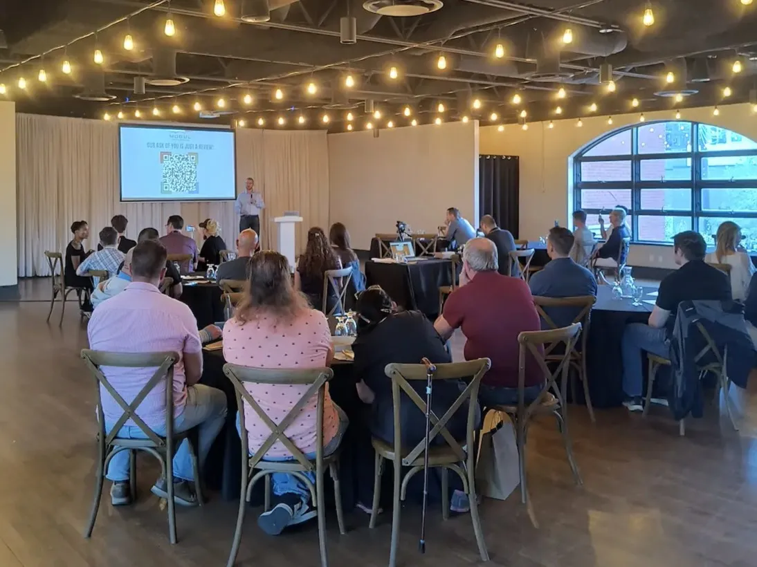 Mitch Petersen presenting at the Mogul Mastermind Meetup in Edmonton, Alberta, June 24, 2026